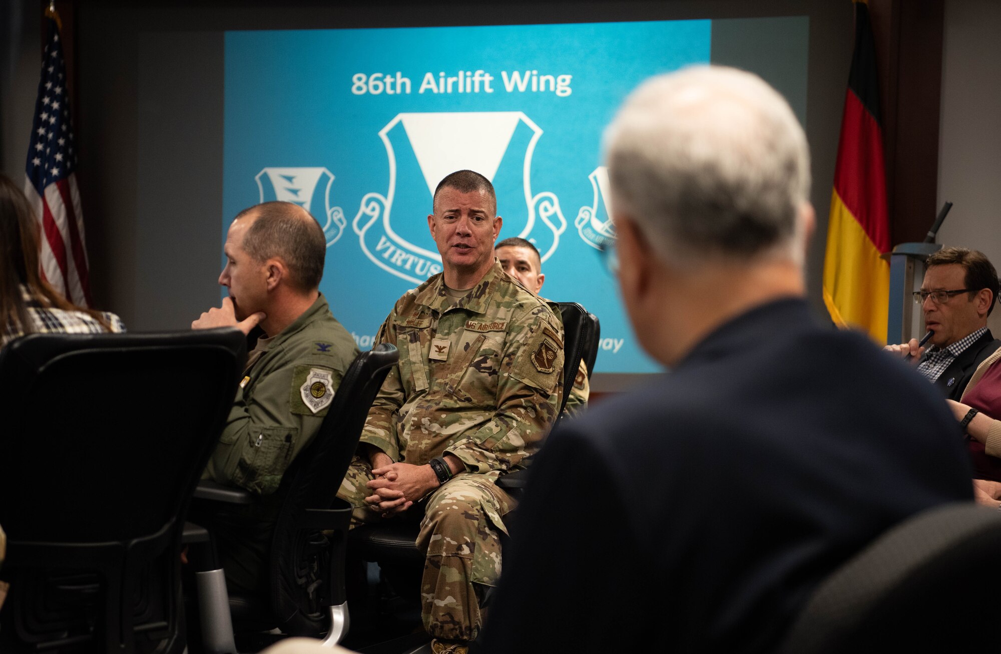 U.S. Air Force Col. Jason Wolff, 86th Logistics Readiness Group commander, answers questions from members of the Air and Space Forces civic leader group during an immersion at Ramstein Air Base, Germany, June 25, 2024. Civic leaders are unpaid advisors, key communicators and advocates for Department of the Air Force issues. The civic leader group engaged in a multi-day tour across U.S. Air Forces in Europe – Air Forces Africa bases to receive valuable familiarization and education on USAFE-AFAFRICA missions, future initiatives, and command priorities. (U.S. Air Force photo by Senior Airman Jared Lovett)