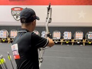 U.S. Army Staff Sgt. John Britton competes in the archery event