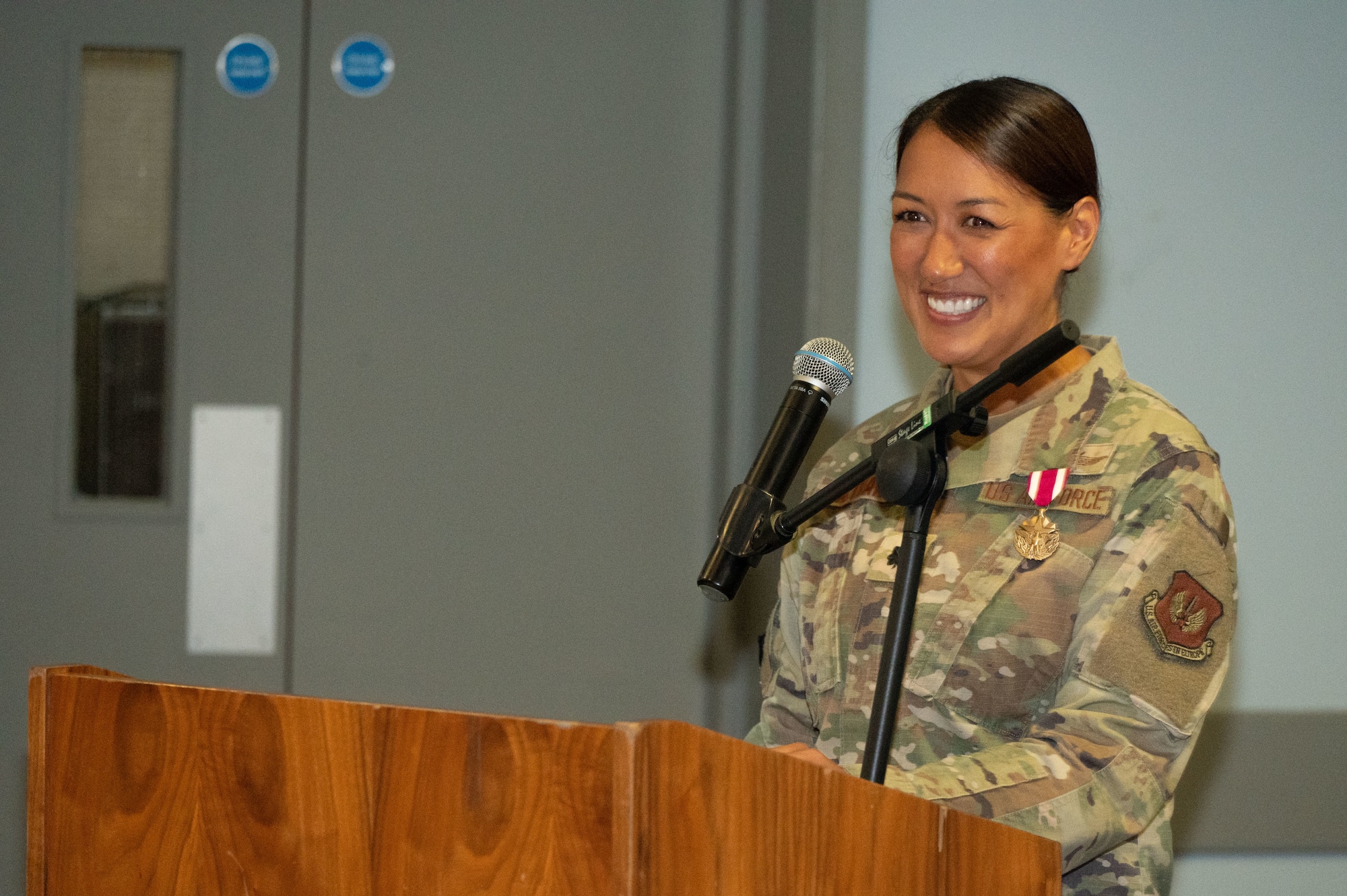 U.S. Air Force Lt. Col. Amanda C. Altman, 422nd Communications Squadron outgoing commander, gives a speech at the 422nd Communications Squadron change of command ceremony.