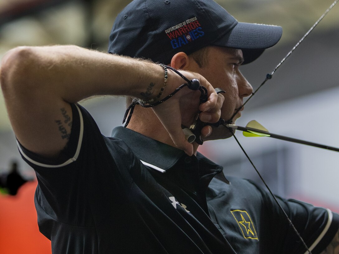 U.S. Army Staff Sgt. John Britton competes in the archery event