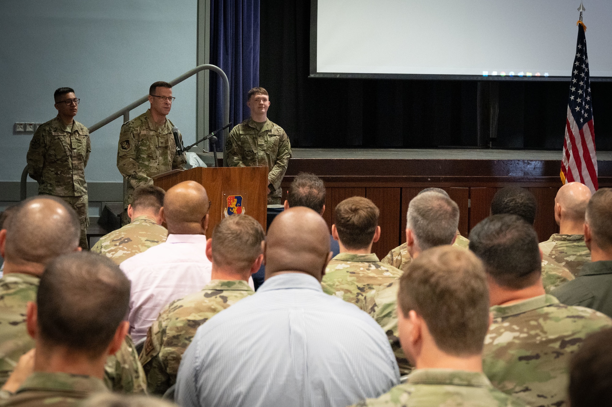 U.S. Air Force Col. Ricardo M. Diaz, 422nd Air Base Group commander, gives a speech at the 422nd Communications Squadron.