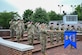 Members of the 11th Security Forces Squadron hold a salute in honor of fallen 11th SFS service members at the closing ceremony of National Police Week on Joint Base Anacostia-Bolling, Washington, D.C., May 17, 2024. The salute was followed by a moment of silence and a rendition of Taps. (U.S. Air Force photo by Airman Shanel Toussaint)