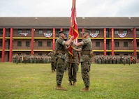 Lt. Col. Joseph E. Moeller (left) and Col. Daniel L. Thunen (right) exchange the U.S. Marine Corps flag during Marine Corps Security Force Battalion’s change of command ceremony at Naval Submarine Base Kings Bay, Georgia. Thunen was relieved by Moeller as the battalion’s commander.  The ceremony was attended by the base’s tenant commanding officers, family, friends, and the nearly 1,100 Marines and Sailors assigned to the battalion. (U.S. Navy photo by Mass Communication Specialist 1st Class Zachary D. Behrend)