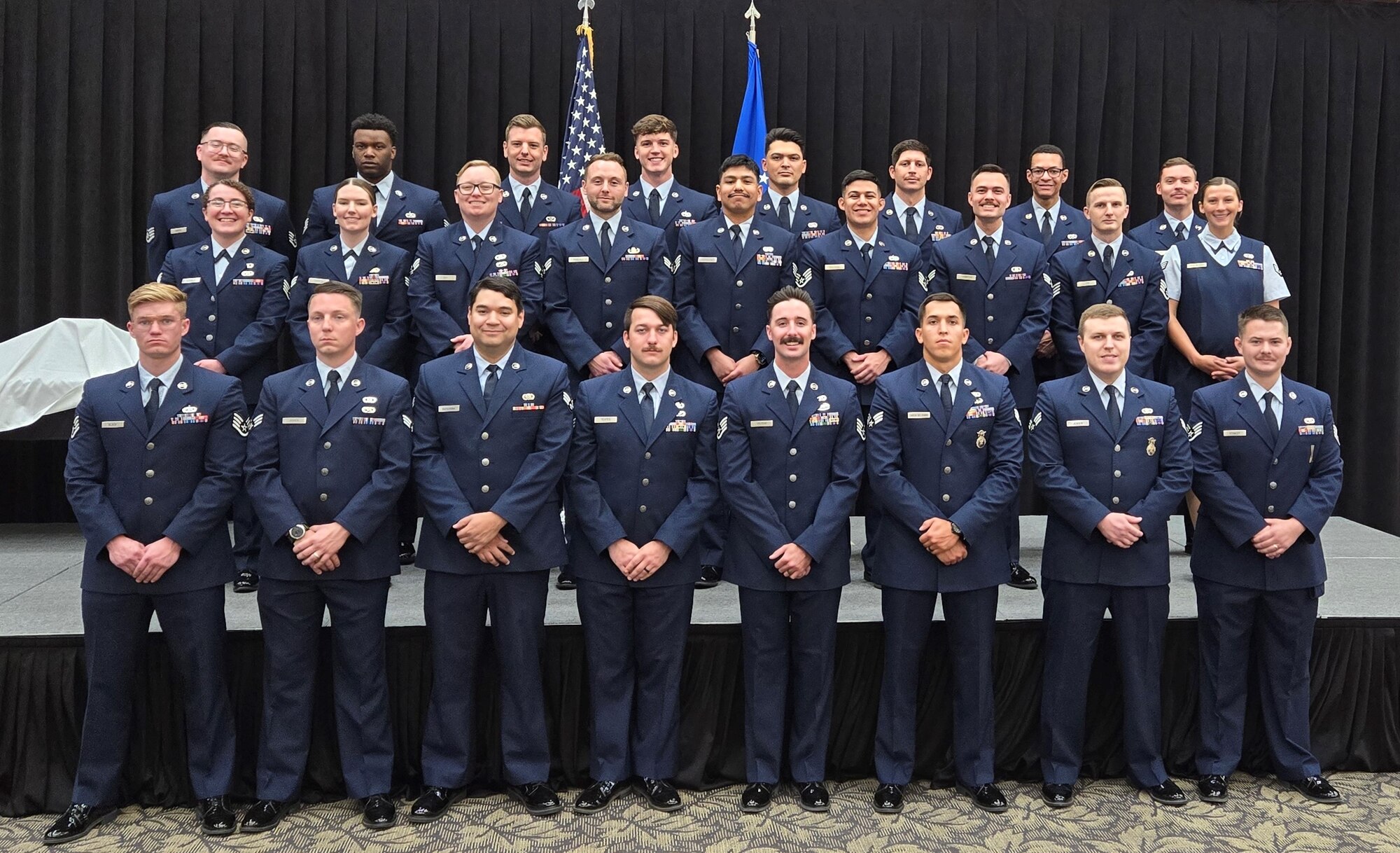 Graduates standing in formation