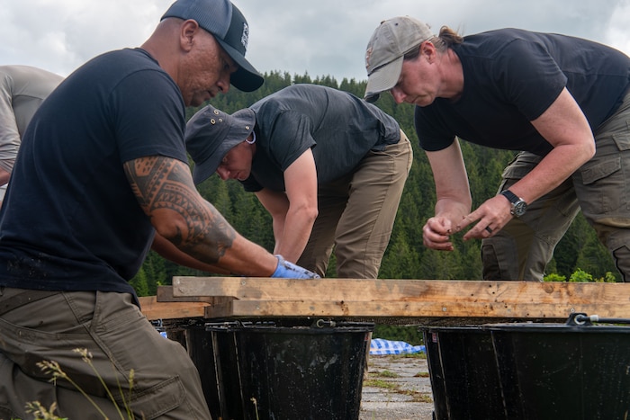 U.S. Army Sgt. 1st Class Patrick Smith, left, a team leader assigned to the Defense POWMIA Accounting Agency (DPAA), U.S. Air Force Master Sgt. Nikola Bozic, center, a linguist attached to DPAA, and Dr. Laurel Freas, right, a forensic anthropologist and scientific recovery expert at DPAA, screen sediment from an ossuary in Bosnia and Herzegovina, May 24, 2024. An ossuary is a container or room used to store the remains of deceased individuals, found in various cultures and historical periods, serving both practical and ceremonial purposes. There are approximately 12 missing personnel in Bosnia and Herzegovina and 72,091 personnel missing from World War II. (U.S. Army photo by Staff Sgt. John Miller)
