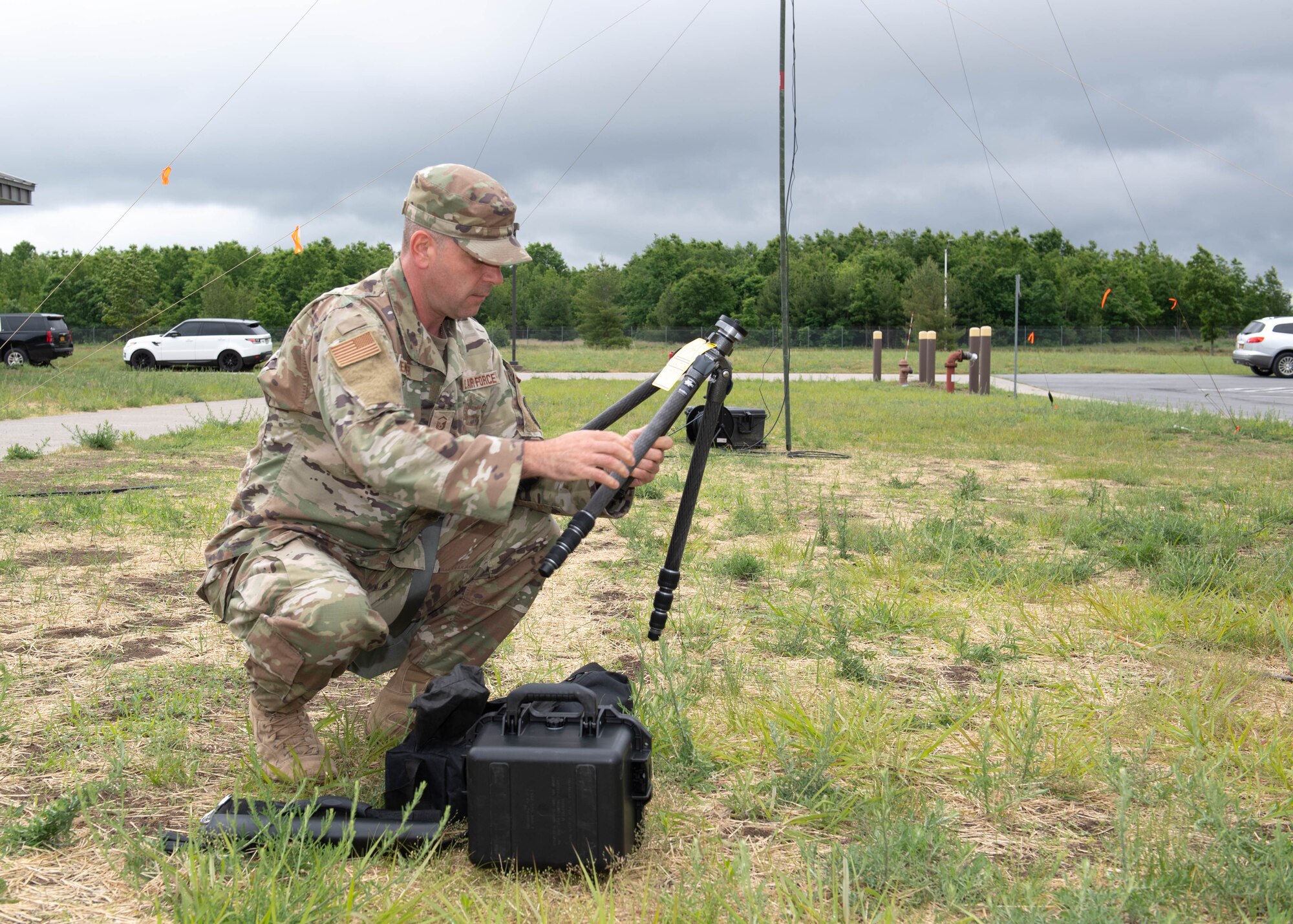 Master Sgt. Ken Wenner sets up and utilizes a micro weather automated observation system and handheld multi-capable weather sensor to keep tabs on weather conditions for Exercise Iron Keystone 2024 components occurring at Fort Drum, N.Y.