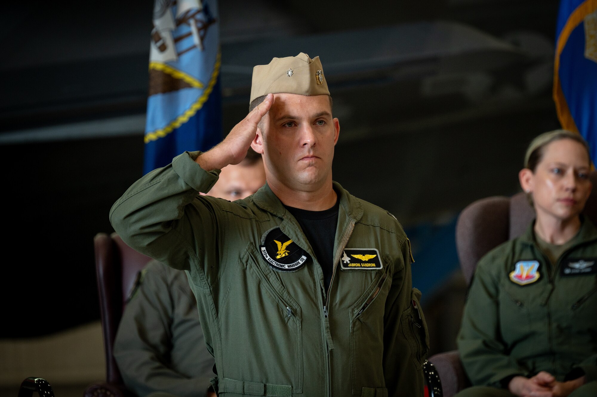 U.S. Navy Cmdr. Alexander Sandroni, 513th Electronic Warfare Squadron commander, renders his first salute to the squadron after taking command during the 513th EWS change of command ceremony at Eglin Air Force Base, Florida, June 18, 2024. The mission of the 513th EWS is to provide combat-credible mission data to the F-35 warfighter, requiring in-depth expertise on the F-35 aircraft, intelligence analysis, mission data programming, and software development. (Courtesy Photo)