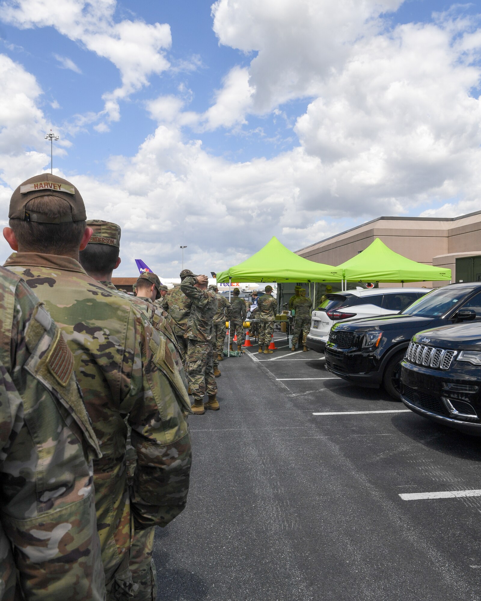 193rd Special Operations Wing Airmen wait to be served food from the Expandable Single Pallet Expeditionary Kitchen in Middletown, Pennsylvania, during Exercise Iron Keystone 24 on June 7, 2024.