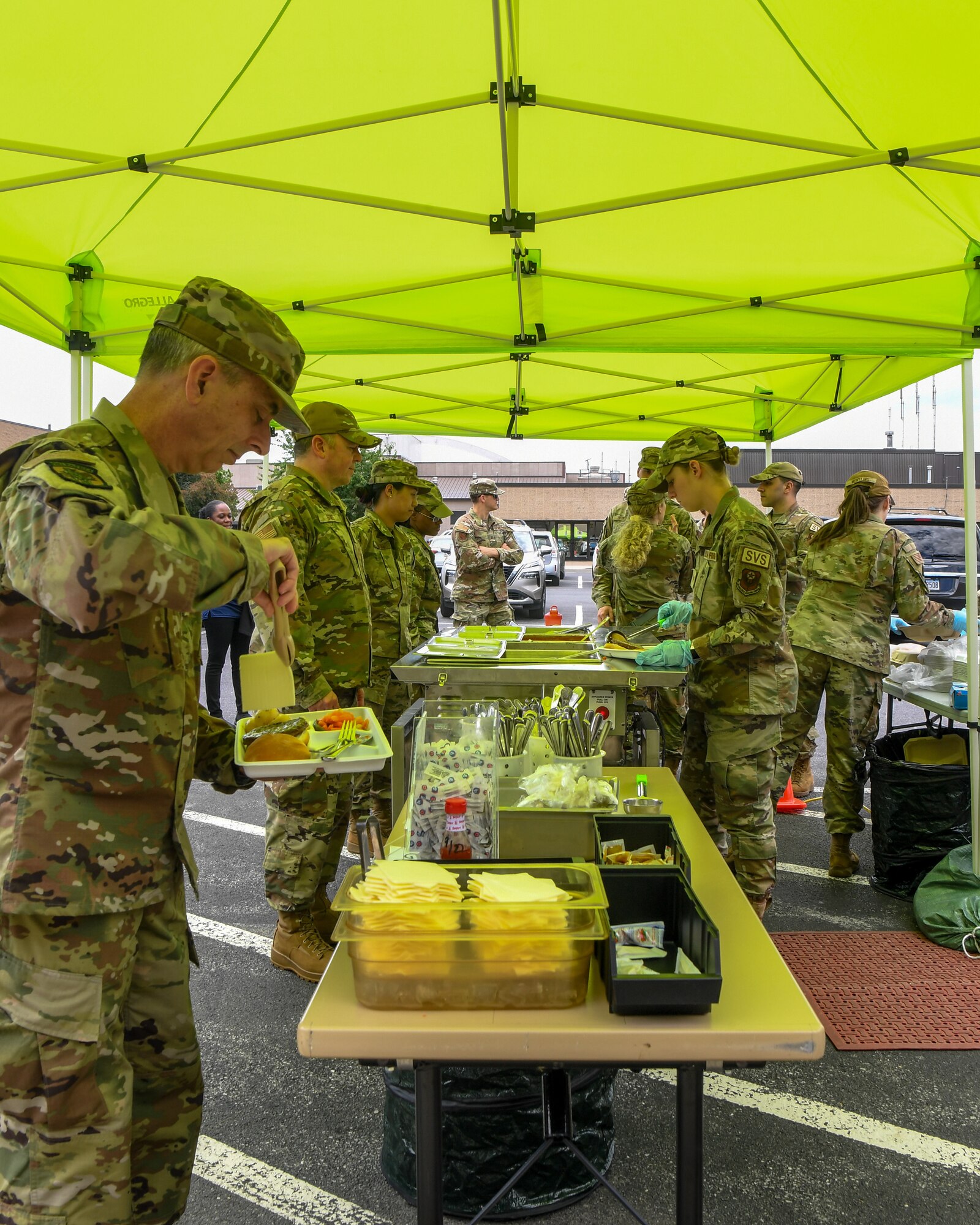 193rd Special Operations Wing Airmen serve food from the Expandable Single Pallet Expeditionary Kitchen in Middletown, Pennsylvania, during Exercise Iron Keystone 24 on June 7, 2024.