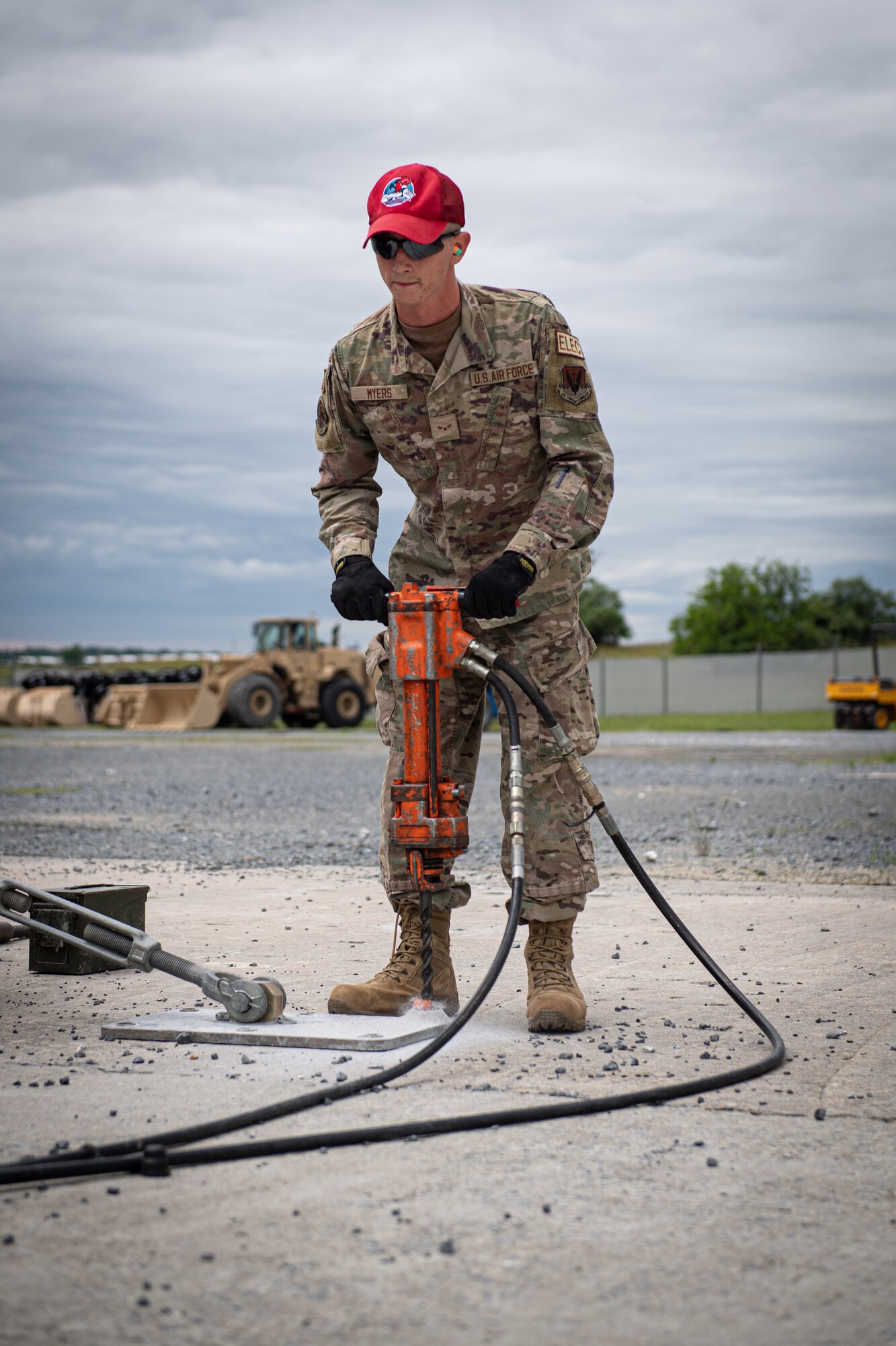 Airmen from the 201st RED HORSE Squadron set up a mobile aircraft arresting system during Pennsylvania Air National Guard exercise Iron Keystone 24 at Fort Indiantown Gap, Pennsylvania, June 9, 2024.