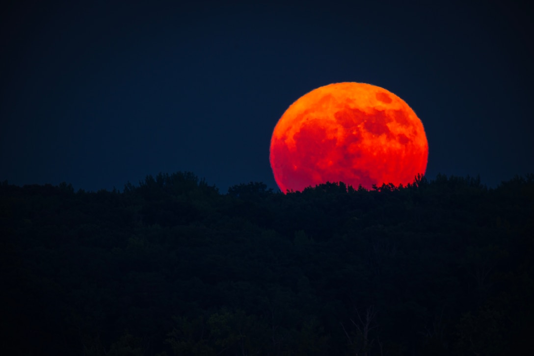 A full moon rises over the Potomac River on Marine Corps Base Quantico, June 21, 2024. The moon, also known as the “strawberry moon”, occurs within a day after the summer solstice every 19 to 20 years making the event rare to observe. (U.S. Marine Corps photo by Lance Cpl. Joaquin Dela Torre)