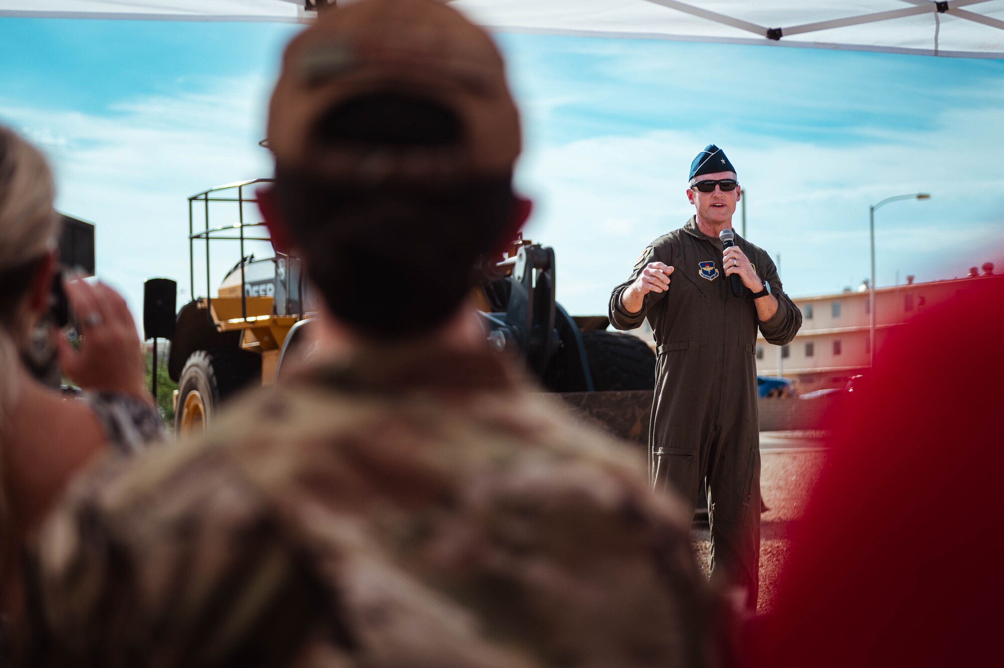 U.S. Air Force Brig. Gen. Jason Rueschhoff, 56th Fighter Wing commander, speaks during the groundbreaking ceremony for a new Honor Guard facility.