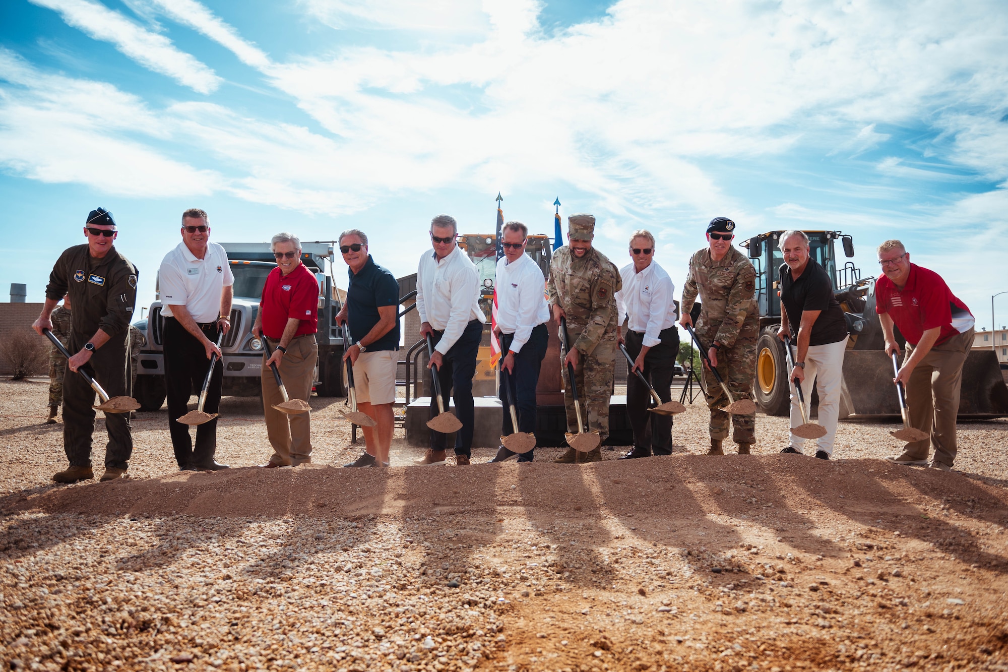 Luke Air Force Base leadership, Fighter Country Foundation members, and honorary commanders, break ground on the new Honor Guard facility.