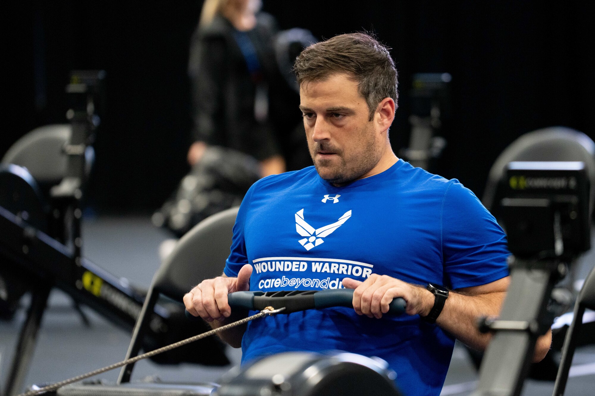 SMSgt Justin Beasley warming up for the 2024 Warrior Games rowing competition.