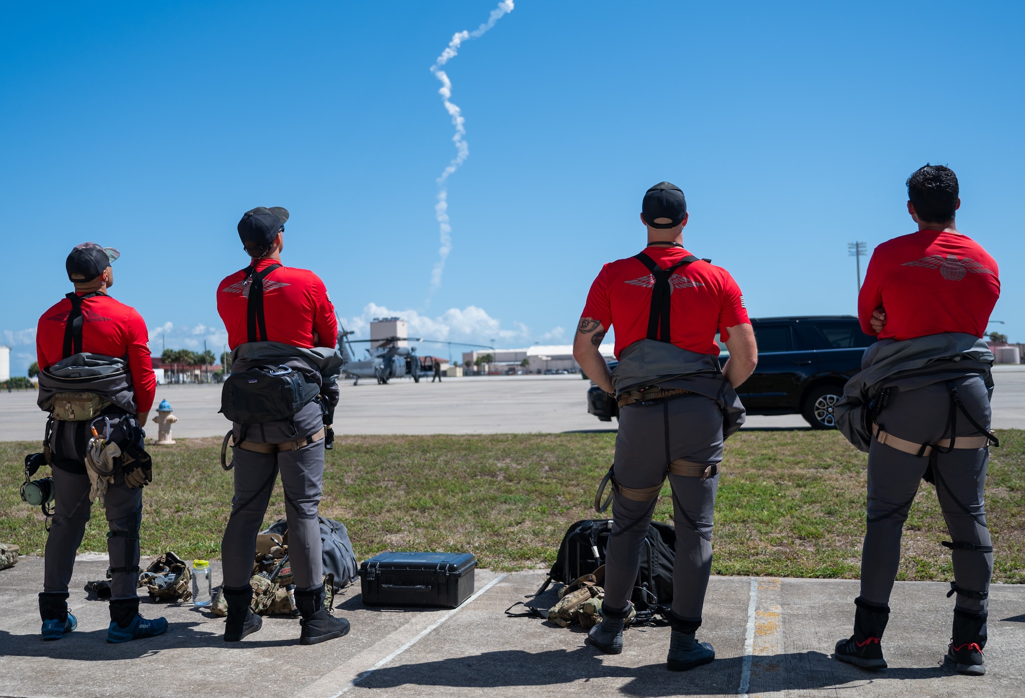 Members of the 347th Rescue Group from Moody Air Force Base, Georgia, watch a launch at Patrick Space Force Base, Florida, June 5, 2024. The team from Moody supported the Atlas V rocket Orbital Crew Flight Test mission, which launched two astronauts from Space Launch Complex 41 on Cape Canaveral Space Force Station, Florida. This was the first time since 1968 astronauts were launched from CCSFS and the first time ever from a Space Force installation. (U.S. Space Force photo by Airman 1st Class Spencer Contreras)
