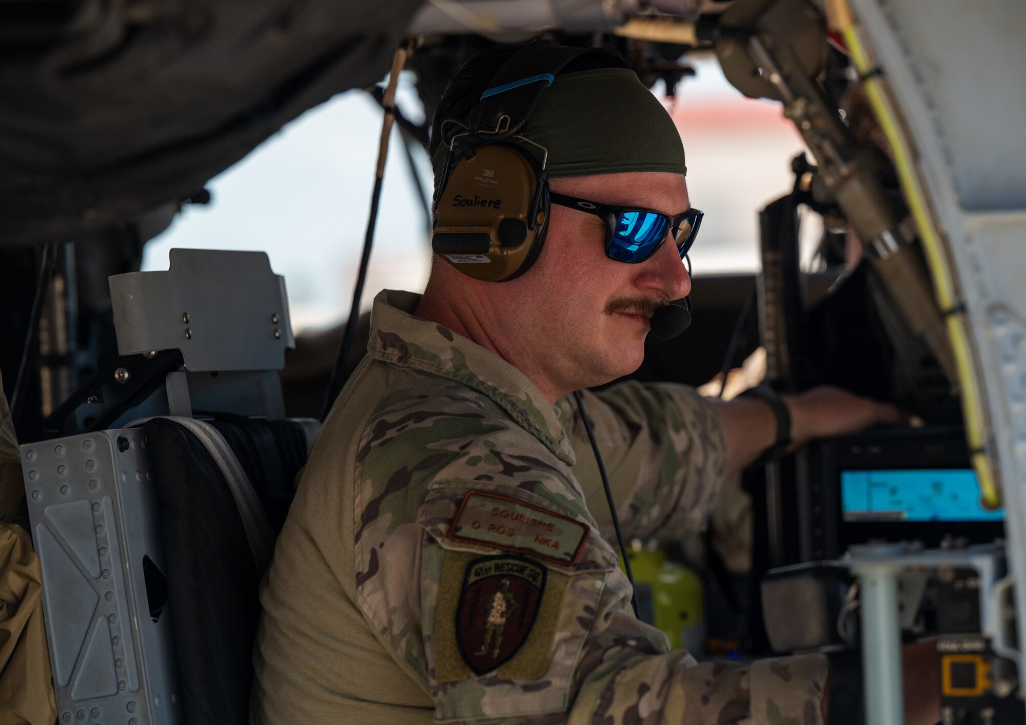 A member of the 347th Rescue Group from Moody Air Force Base, Georgia, conducts pre-flight operations in a HH-60W at Patrick Space Force Base, Florida, June 1, 2024. The team from Moody supported the Atlas V rocket Orbital Crew Flight Test mission, which launched two astronauts from Space Launch Complex 41 on Cape Canaveral Space Force Station, Florida. This was the first time since 1968 astronauts were launched from CCSFS and the first time ever from a Space Force installation. (U.S. Space Force photo by Airman 1st Class Spencer Contreras)