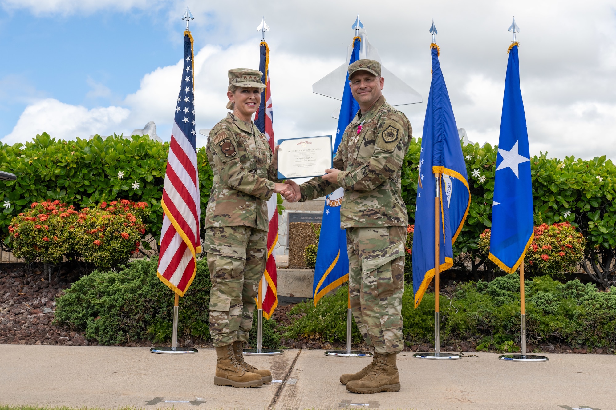 Airmen hold a certificate.