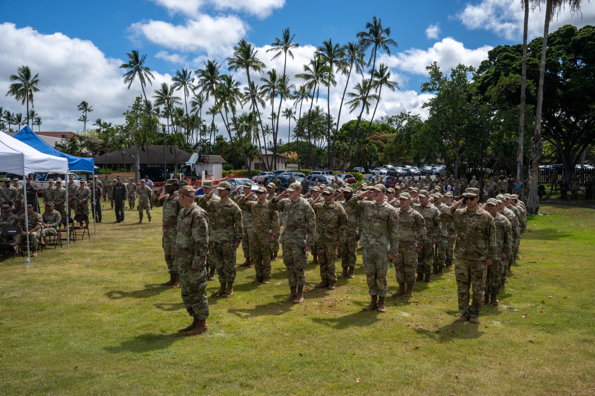 Airmen stand in formation.