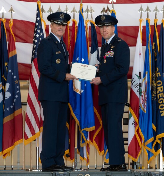 The new 5th Bomb Wing (BW) commander's name is revealed the 5th Bomb Wing flagship B-52H Stratofortress during the change of command ceremony at Minot Air Force Base, North Dakota, June 28, 2024. Prior to assuming command of the 5th BW, Lamarand was the commander of the 2nd Operations Group, Barksdale Air Force Base, La, leading daily operations for the Air Forces's largest bomber group consisting of four operational squadrons, with over 560 personnel. (U.S. Air Force photo by Airman 1st Class Luis Gomez)