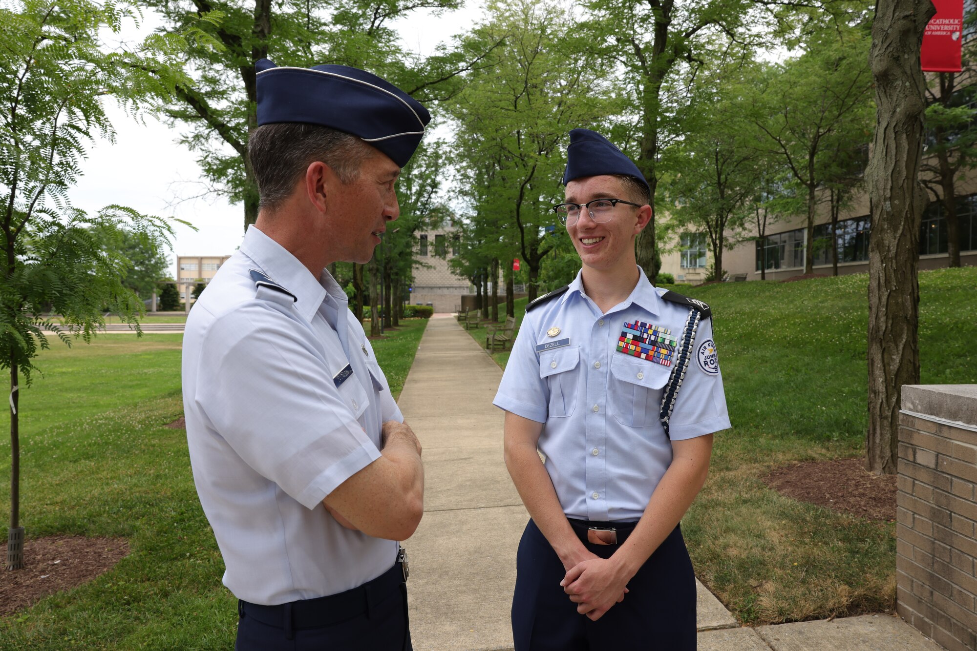 Brig. Gen. Houston Cantwell, Commander of the Jeanne M. Holm Center for Officer Accessions and Citizen Development talks with Cadet Sean Dezell from Valencia High School at the 2024 JROTC Leadership and Academic Bowl on June 23 in Washington D.C.