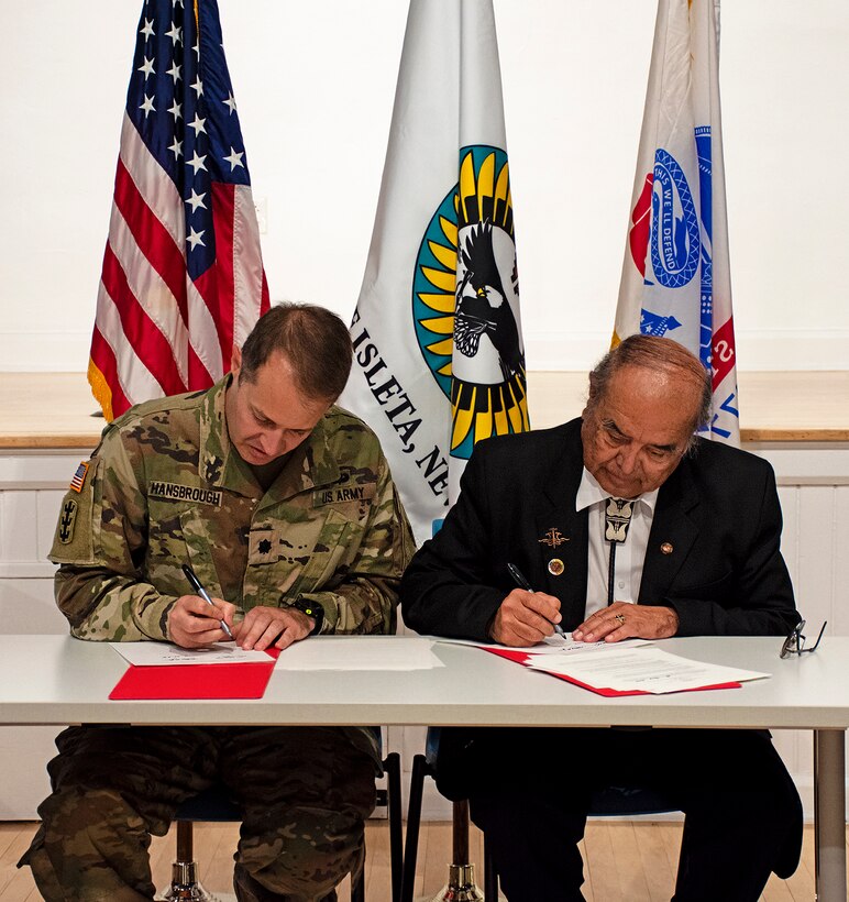 Lt. Col. Jerre Hansbrough, left, commander, USACE-Albuquerque District, and Max Zuni, governor, Pueblo of Isleta, sign a partnership agreement at the Pueblo of Isleta Cultural Center, June 26, 2024. The agreement is the first ever study USACE will conduct under guidelines to the Tribal Partnership Program were updated in 2023.