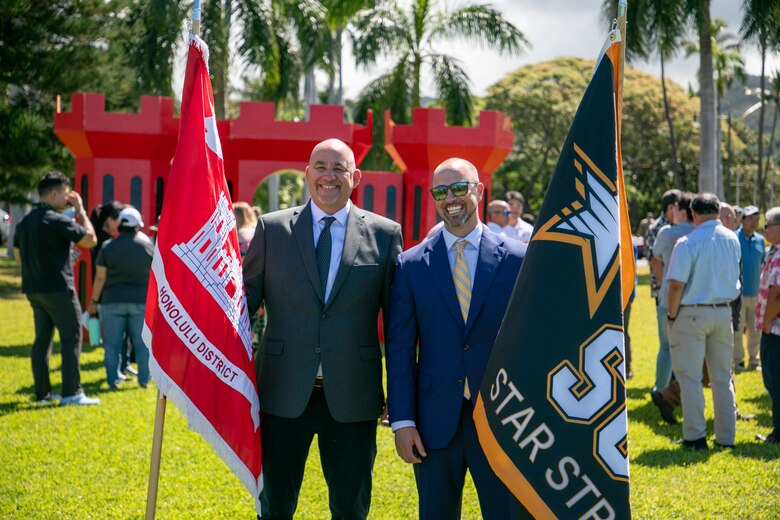 Troy Larson, Headquarters, U.S. Army Corps of Engineers Safety and Occupational Health Manager, and Jeremy McCranie, Safety & Occupational Health Manager for the Honolulu District, pose for a photo during a ceremony to present the prestigious Army Safety and Occupational Health Star Award to the Honolulu District, U.S. Army Corps of Engineers on Fort Shafter June 28, 2024.