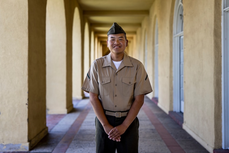 U.S. Marine Corps Pfc. Jiang Xinnian, a native of China and recruited from Pasadena, Calif. with Echo Company, 2nd Recruit Training Battalion, poses for a photo after a naturalization ceremony at Marine Corps Recruit Depot, San Diego, June 27, 2024. The naturalization ceremony took place during family day to recognize Marines who became United States citizens by completing bootcamp. (U.S. Marine Corps photo by Sgt. Yvonna Guyette)