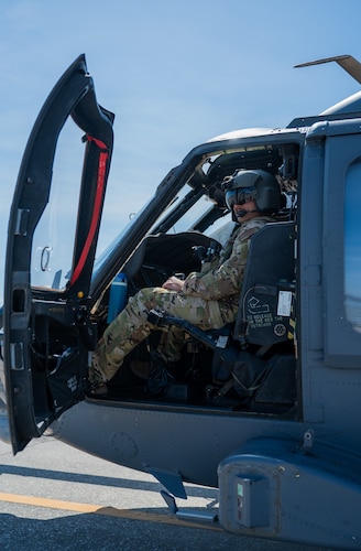 U.S. Air Force Capt. Teague Bredl, 41st Rescue Squadron HH-60W co-pilot from Moody Air Force Base, Georgia, sits in the cockpit of a helicopter at Patrick Space Force Base, Florida, June 1, 2024. The team from Moody supported the Atlas V rocket Orbital Crew Flight Test mission, which launched two astronauts from Space Launch Complex 41 on Cape Canaveral Space Force Station, Florida. This was the first time since 1968 astronauts were launched from CCSFS and the first time ever from a Space Force installation. (U.S. Space Force photo by Airman 1st Class Spencer Contreras)