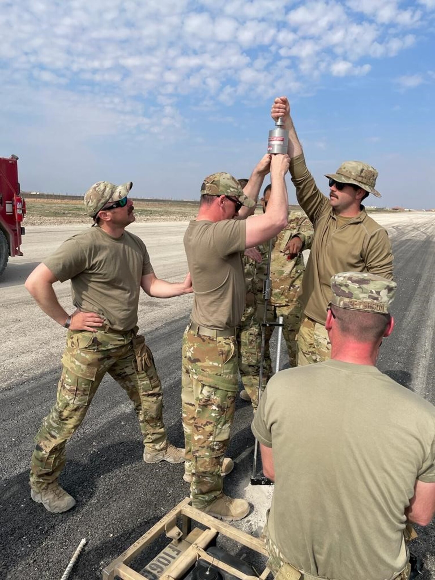 Airmen assigned to the 1st Expeditionary Theater Support Group evaluate an airfield at an undisclosed location within the U.S. Central Command area of responsibility, May 18, 2024. The ETSG includes Contracting, Communications, Civil Engineer and logistics services. (U.S. Air Force Courtesy photo)