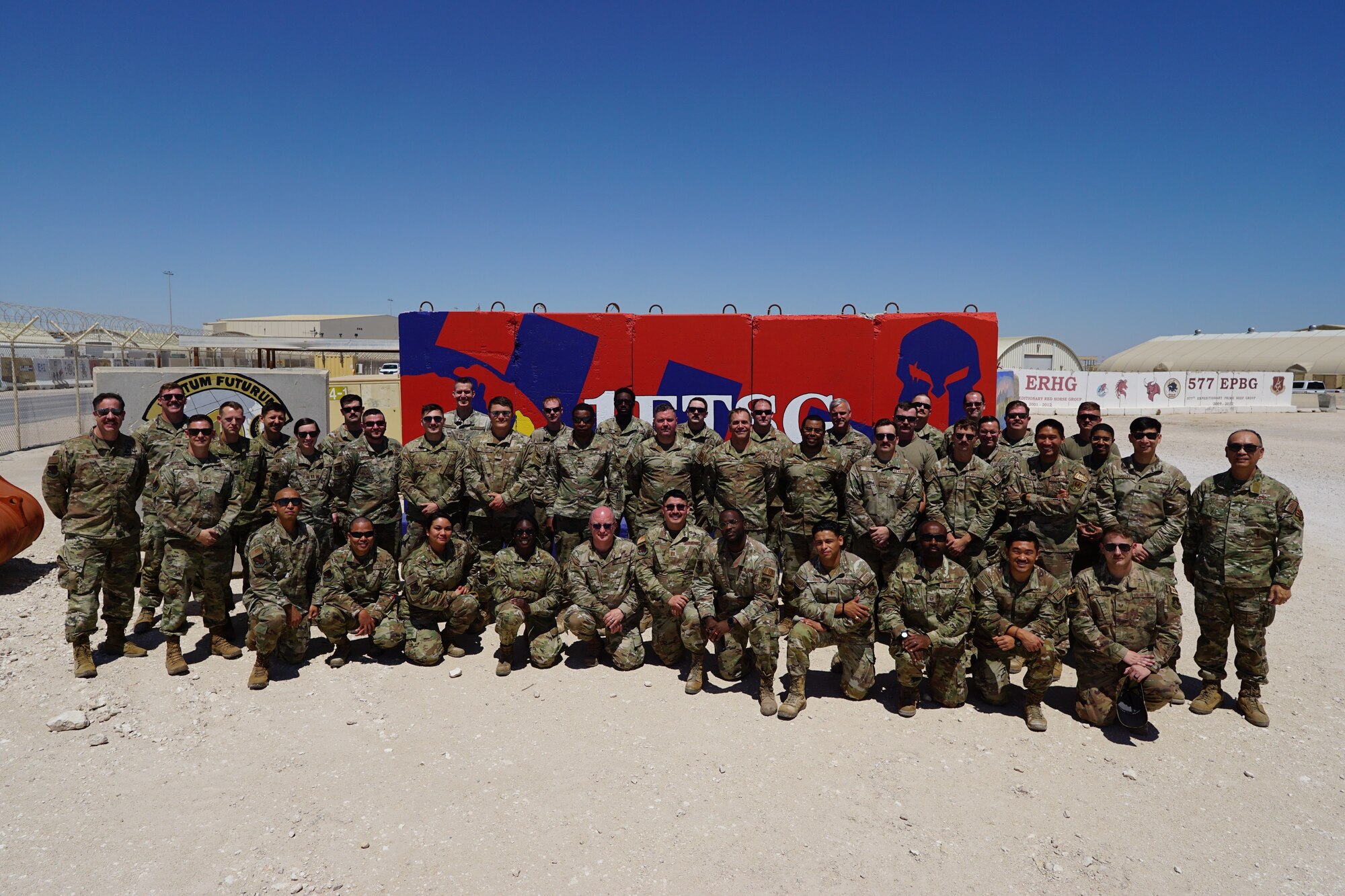 Airmen assigned to the 1st Expeditionary Theater Support Group pause for a group photo at an undisclosed location within the U.S. Central Command area of responsibility, March 27, 2023. The ETSG’s main priorities are setting the theater, supporting the theater, long-term posture of the theater, and innovation for the theater. (U.S. Air Force Courtesy photo)