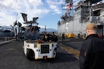 SOUDA BAY, GREECE (Feb. 28, 2024) Aviation Ordnanceman 2nd Class Xerses Havis, left, and Aviation Ordnanceman 3rd Class Timmy Bellard, both assigned to the Wasp-class amphibious assault ship USS Bataan (LHD 5), stand watch as the small caliber action team during sea and anchor in Souda Bay, Greece, Feb. 28. Bataan is on a scheduled deployment in the U.S. Naval Forces Europe area of operations, employed by U.S. 6th Fleet to defend U.S., allied and partner interests. (U.S. Navy photo by Mass Communication Specialist 2nd Class Danilo Reynoso)