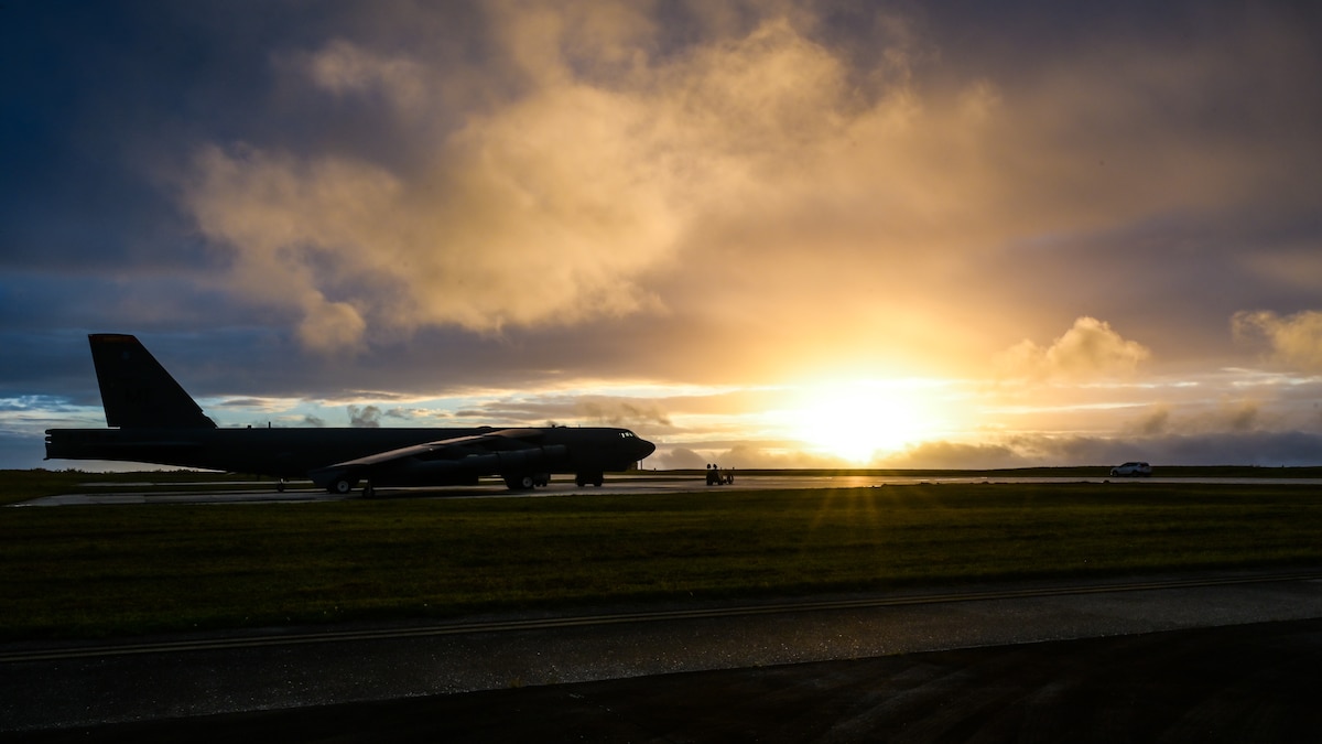 A U.S. Air Force B-52H Stratofortress assigned to the 23rd Expeditionary Bomb Squadron sits at sunrise