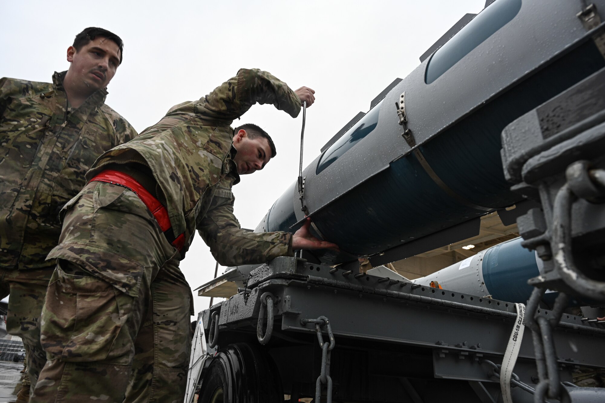 U.S. Airmen assigned to the 4th Munitions Squadron participates in an annual load crew competition at Seymour Johnson Air Force Base, North Carolina, on Feb. 23, 2024. Every year, a load crew from each unit goes head-to-head in a competition that tests their dress and appearance, weapons knowledge and speed and accuracy of loading munitions on an F-15E Strike Eagle. (U.S. Air Force photo by Staff Sgt. Koby I. Saunders)