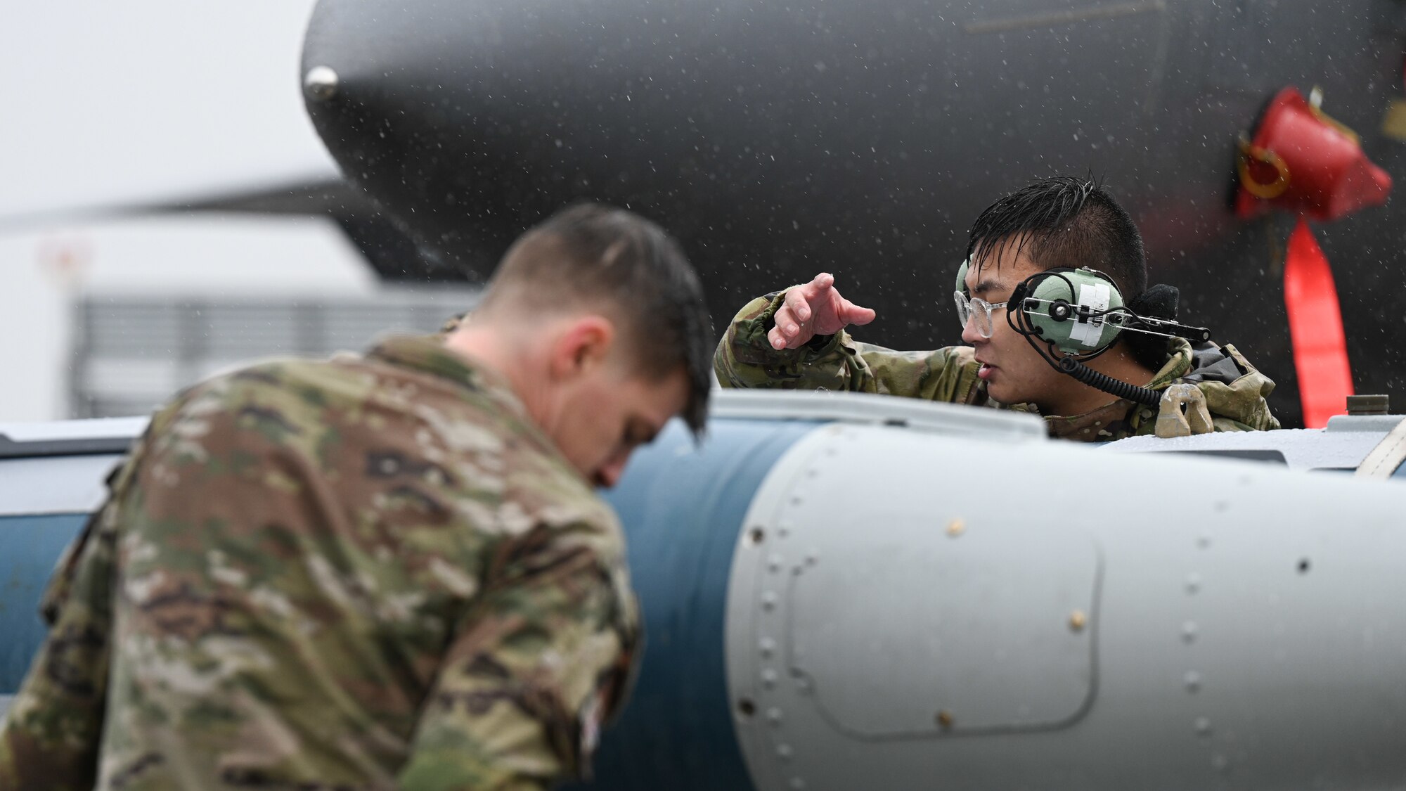 U.S. Air Force Staff Sgt. Jeffrey Pagtama, a weapons load crew chief assigned to the 333rd Fighter Generation Squadron, prepare to load munitions during an annual load crew competition at Seymour Johnson Air Force Base, North Carolina, on February 23, 2024. Every year, a load crew from each unit goes head-to-head in a competition that tests their dress and appearance, weapons knowledge and speed and accuracy of loading munitions on an F-15E Strike Eagle. (U.S. Air Force photo by Staff Sgt. Koby I. Saunders)