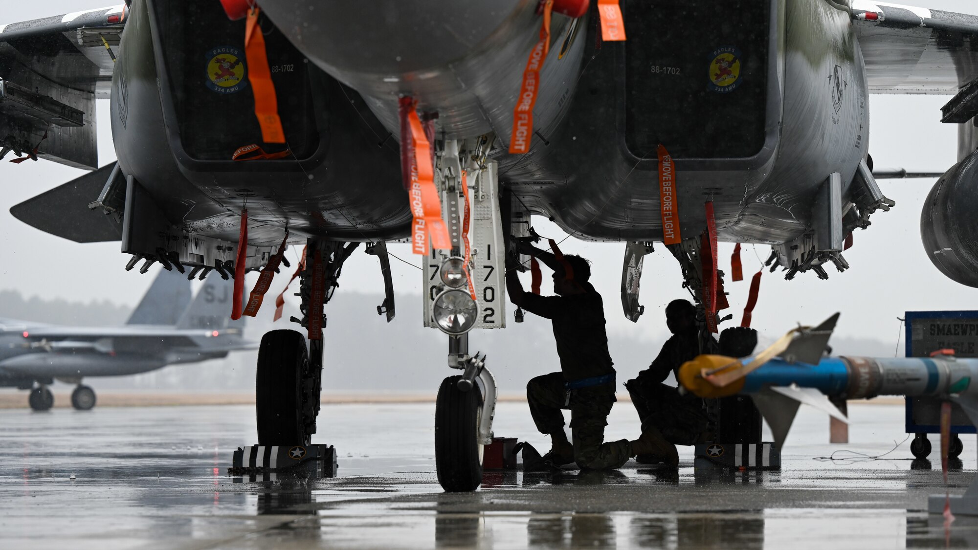 U.S. Airmen assigned to the 334th Fighter Generation Squadron participate in an annual load crew competition at Seymour Johnson Air Force Base, North Carolina, on February 23, 2024. The teams consisted of Airmen assigned to the 333rd, 334th, 335th and 336th Fighter Generations Squadrons, as well as the 414th Fighter Group. (U.S. Air Force photo by Staff Sgt. Koby I. Saunders)