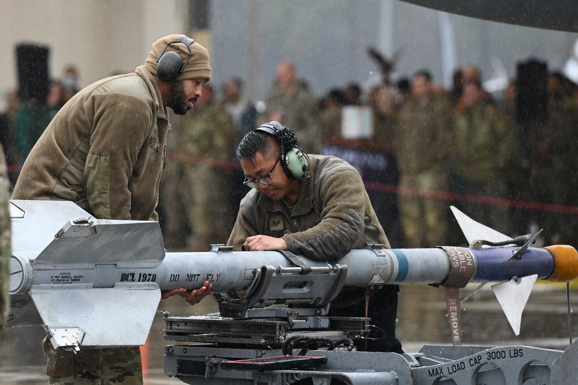 U.S. Air Force Staff Sgt. Brice, left, and Staff Sgt. Jeffrey James Pagtama, a weapons load crew chief assigned to the 333rd Fighter Generation Squadron, participate in an annual load crew competition at Seymour Johnson Air Force Base, North Carolina, on February 23, 2024. The teams consisted of Airmen assigned to the 333rd, 334th, 335th and 336th Fighter Generations Squadrons, as well as the 414th Fighter Group. (U.S. Air Force photo by Staff Sgt. Koby I. Saunders)