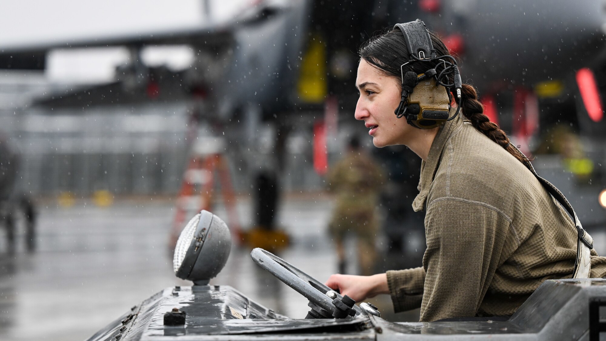 U.S. Air Force Staff Sgt. Christina Olazagsti, a weapons load crew member assigned to the 333rd Fighter Generation Squadron, drives a missile carrier during an annual load crew competition during an annual load crew competition at Seymour Johnson Air Force Base, North Carolina, on February 23, 2024. The teams consisted of Airmen assigned to the 333rd, 334th, 335th and 336th Fighter Generations Squadrons, as well as the 414th Fighter Group. (U.S. Air Force photo by Staff Sgt. Koby I. Saunders)