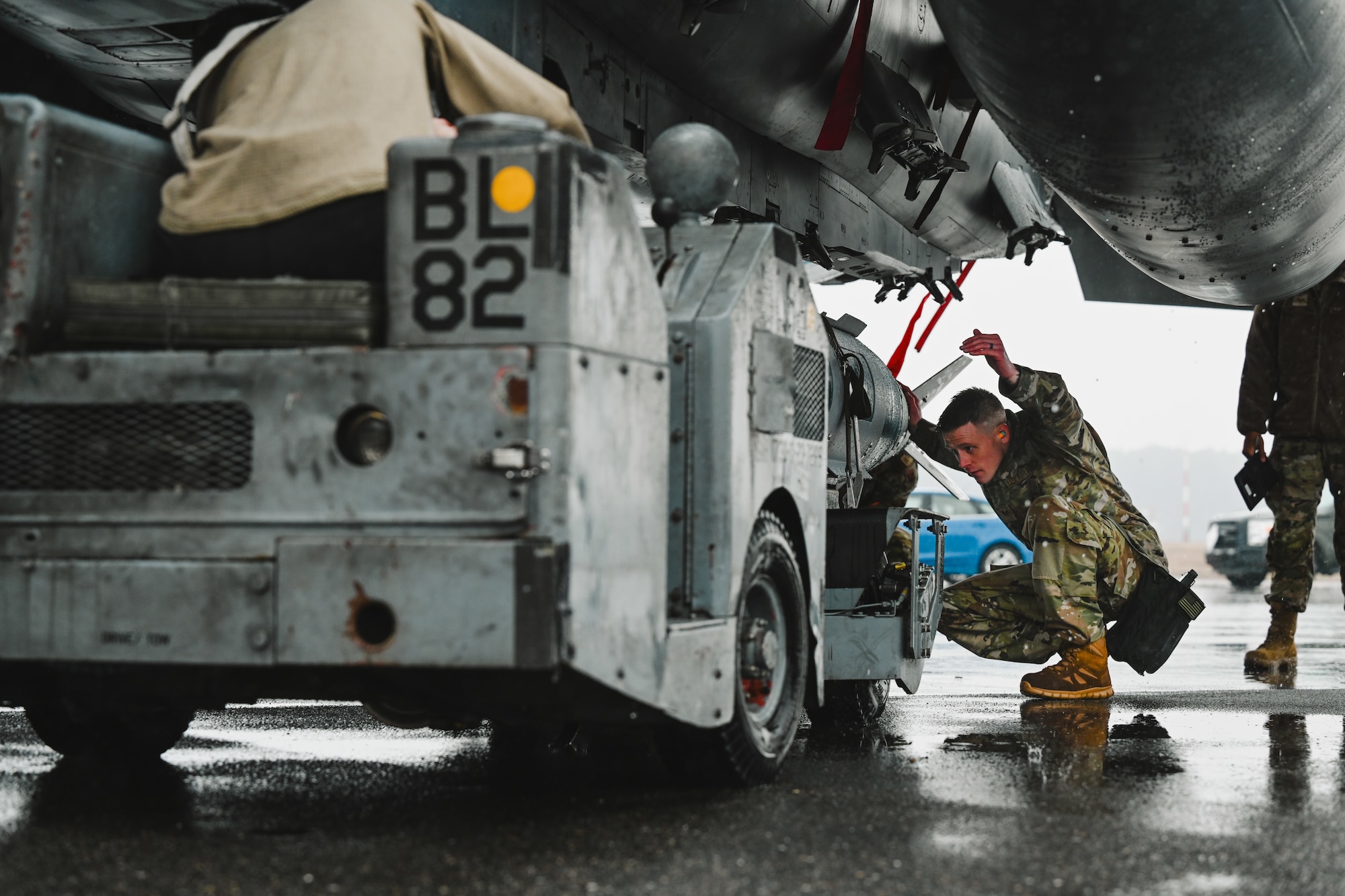 U.S. Air Force Airman 1st Class Kyle Stowers, a weapons load crew member assigned to the 333rd Fighter Generation Squadron, loads munitions on an F-15E Strike Eagle during an annual load crew competition at Seymour Johnson Air Force Base, North Carolina, on February 23, 2024. The teams consisted of Airmen assigned to the 333rd, 334th, 335th and 336th Fighter Generations Squadrons, as well as the 414th Fighter Group. (U.S. Air Force photo by Staff Sgt. Koby I. Saunders)