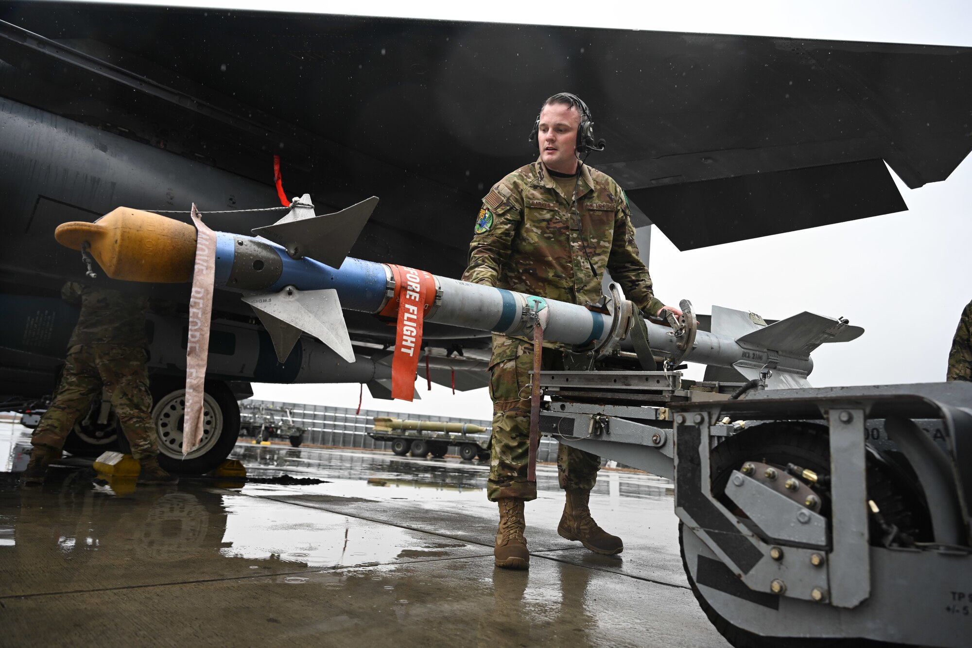 U.S. Air Force Staff Sgt. Cliffton Barker, a weapons load crew chief assigned to the 335th Fighter Generation Squadron, load munitions on an F-15E Strike Eagle during an annual load crew competition at Seymour Johnson Air Force Base, North Carolina, on February 23, 2024. The teams consisted of Airmen assigned to the 333rd, 334th, 335th and 336th Fighter Generations Squadrons, as well as the 414th Fighter Group. (U.S. Air Force photo by Staff Sgt. Koby I. Saunders)