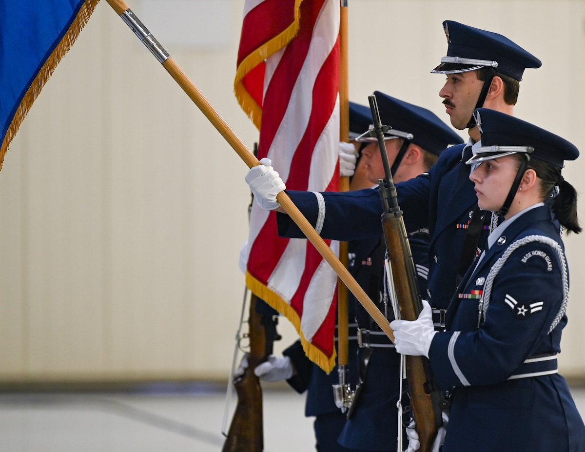633rd Air Base Wing Honor Guard present the colors during the national anthem.