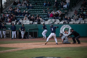 Naval Academy cadet Logan Keller up to bat during the 14th Annual Freedom Classic baseball series at Grainger Stadium in Kinston, North Carolina, Feb. 24, 2024.  The Naval Academy lost 4 - 3 to the Air Force Academy. (U.S. Air Force photo by Airman 1st Class Rebecca Sirimarco-Lang)