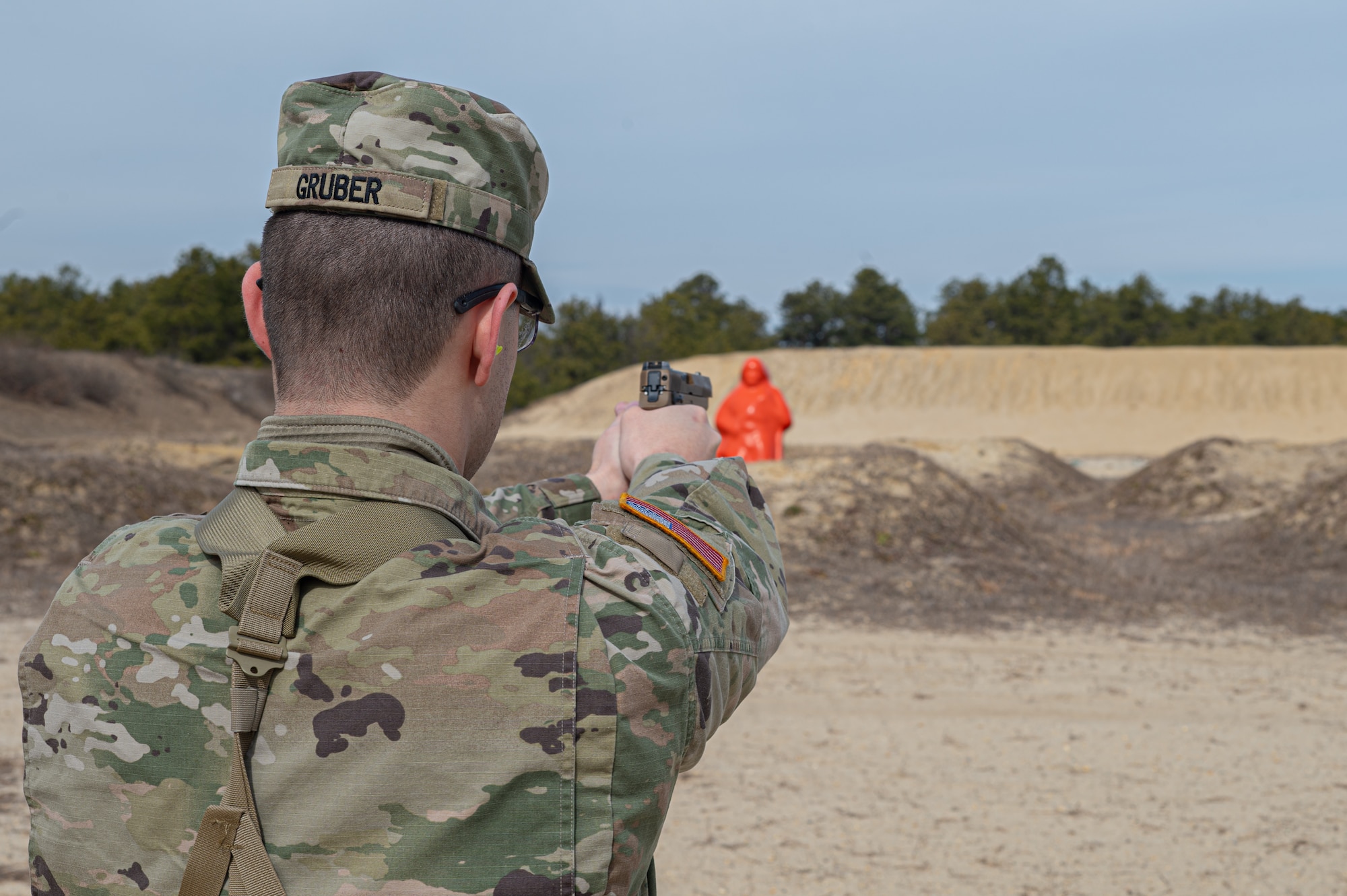 U.S. Army Spc. Trevor Gruber, Alpha Company, 378th Expeditionary Military Intelligence Battalion, 336th Expeditionary Military Intelligence Brigade, Military Intelligence Readiness Command intelligence analyst, fires a Sig Sauer M-17 during the Best Warrior Competition at Joint Base McGuire-Dix-Lakehurst, N.J., Feb. 22, 2024. Participants underwent rigorous evaluations by seasoned leaders who are subject matter experts in their respective fields. The assessments encompassed a wide range of military skills tests, including physical fitness, weapons knowledge, marksmanship, land navigation, general military knowledge and more. (U.S. Air Force photo by Senior Airman Simonne Barker)