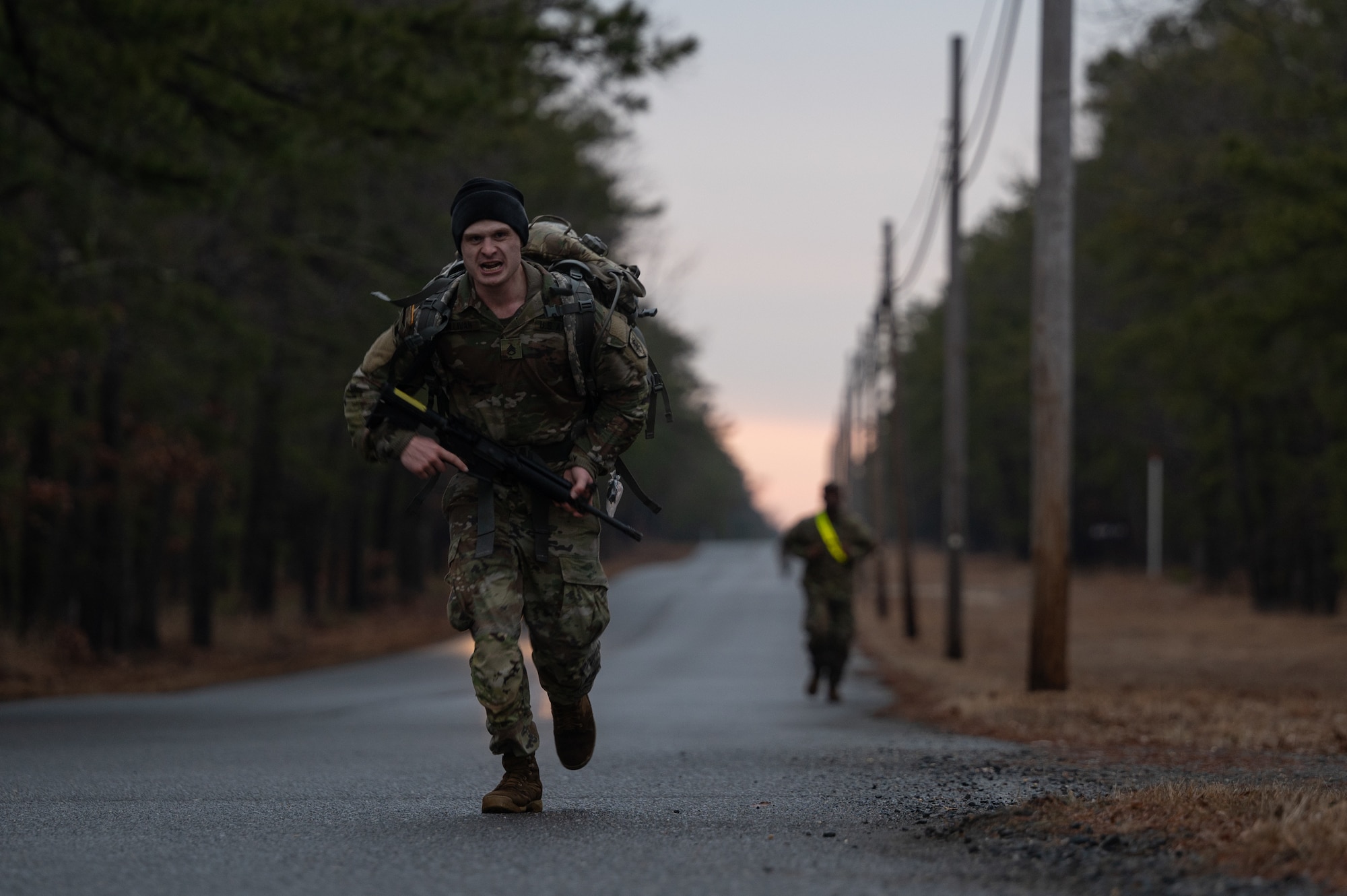U.S. Army Staff Sgt. Timothy Sullivan, Military Intelligence Readiness Command, National Intelligence Support Group, 2300 Military Intelligence Group, Detachment 3 intelligence analyst, competes in a ruck during the Best Warrior Competition at Joint Base McGuire-Dix-Lakehurst, N.J., Feb. 22, 2024. Participants underwent rigorous evaluations by seasoned leaders who are subject matter experts in their respective fields. The assessments encompassed a wide range of military skills tests, including physical fitness, weapons knowledge, marksmanship, land navigation, general military knowledge and more. (U.S. Air Force photo by Airman 1st Class Aidan Thompson)