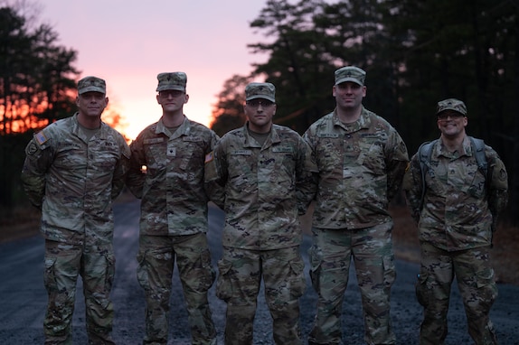 U.S. Army Soldiers pose for a photo during the Best Warrior Competition at Joint Base McGuire-Dix-Lakehurst, N.J., Feb. 22, 2024. Participants underwent rigorous evaluations by seasoned leaders who are subject matter experts in their respective fields. The assessments encompassed a wide range of military skills tests, including physical fitness, weapons knowledge, marksmanship, land navigation, general military knowledge and more. (U.S. Air Force photo by Airman 1st Class Aidan Thompson)
