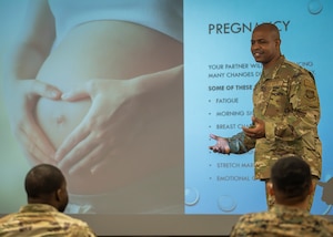 U.S. Air Force Master Sgt. Craig Miller, 6th Maintenance Group first sergeant, leads a discussion about fatherhood during a Dad's 101 workshop at MacDill Air Force Base, Florida, Feb. 28, 2024. The fatherhood workshop was held to educate new or expectant dads on care for infants, supporting partners, preparation for labor and delivery, and coping with lifestyle changes. (U.S. Air Force photo by Senior Airman Lauren Cobin)