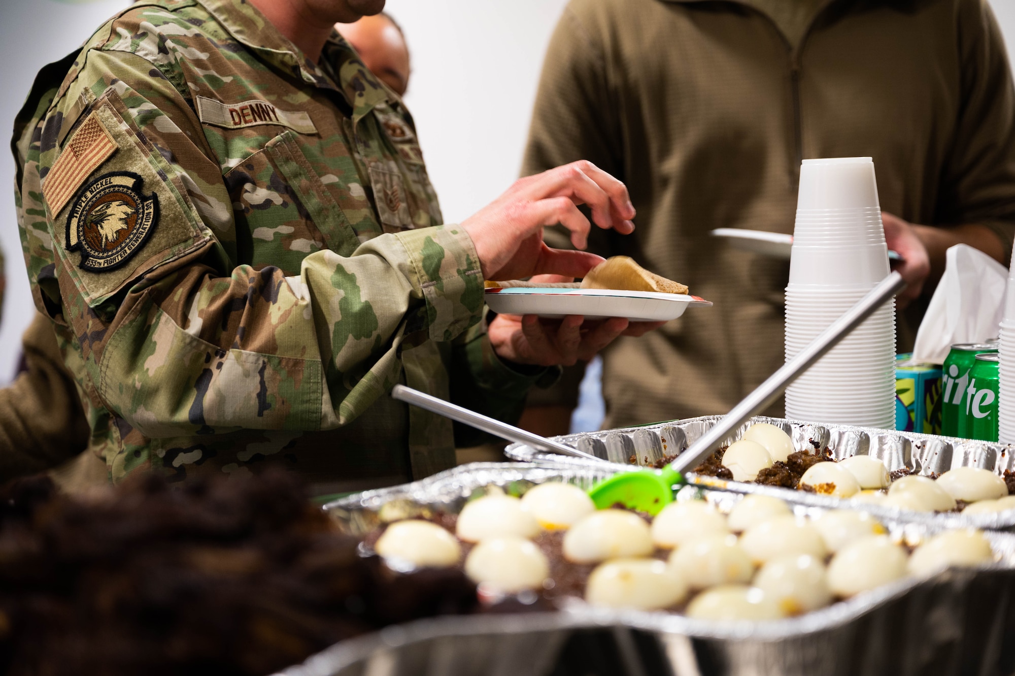 a person serves themselves food