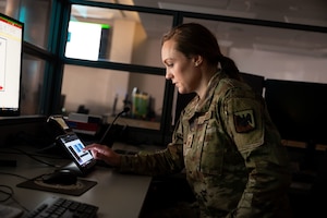 U.S. Air Force Senior Master Sgt. Katelyn S. Murphy, superintendent, Crisis Action Team, Air National Guard Readiness Center, National Guard Bureau, simulates gathering pertinent information on crises and events used to inform National Guard senior leaders, at the ANGRC, Joint Base Andrews, Maryland, Feb. 29, 2024. During event and crisis support, the CAT acts as the central Air Guard point of contact, providing enhanced operational continuity between commanders in the field and senior leaders at NGB.