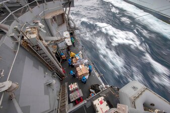 USS Philippine Sea (CG 58) replenishes in the Red Sea.