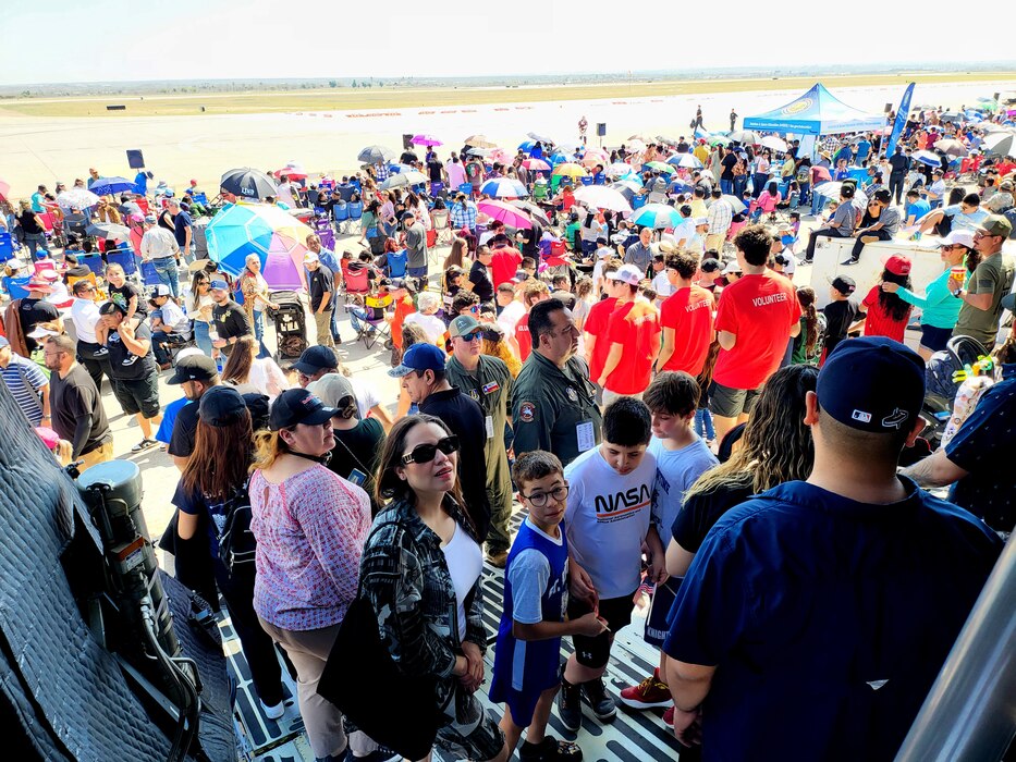 Washington’s Birthday Celebration Association Stars and Stripes Air Show Spectacular attendees watch the flightline in anticipation of aircraft taking flight at the Laredo International Airport in Laredo, Texas Feb. 25, 2024.
