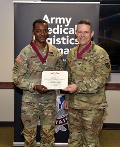 Lt. Col. Ibrahim Kabbah, left, is pictured with Col. Marc Welde, commander of U.S. Army Medical Logistics Command, after Kabbah’s induction into the Order of Military Medical Merit Feb. 29 at Fort Detrick, Maryland.